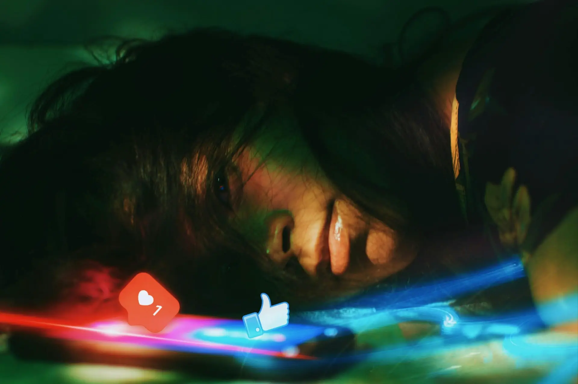 Artistic portrait of a woman expressing loneliness with social media icons in focus. Captivating light effects.